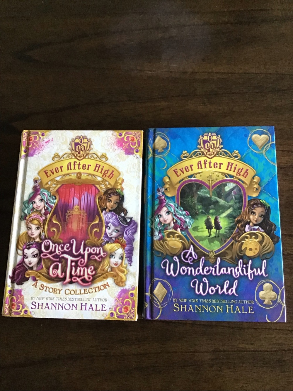 Two Ever After High Hard Cover Books